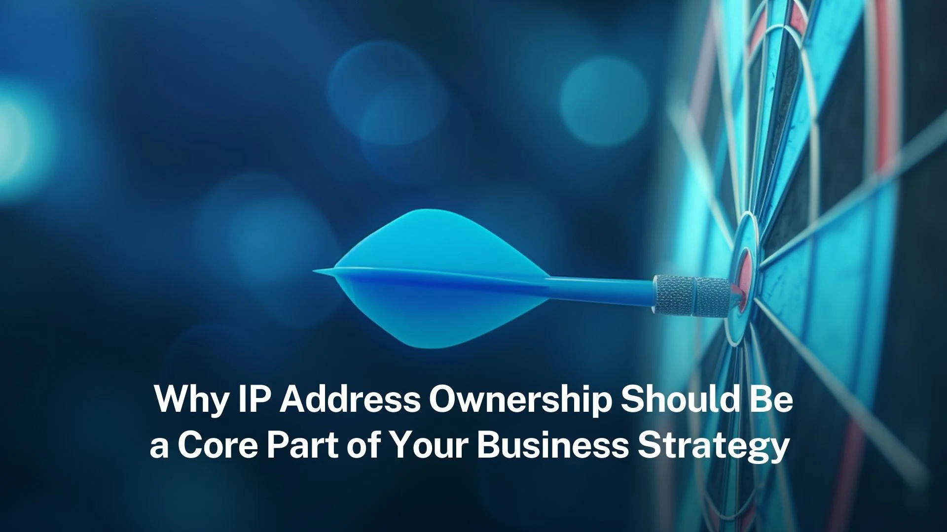 ダーツボードの中心に刺さった青いダーツ。タイトルは「Why IP Address Ownership Should Be a Core Part of Your Business Strategy」。